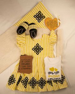Yellow cloth with black cross embroidery