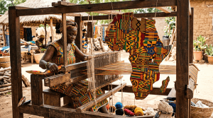 Wooden loom weaving African continent-shaped vibrant fabrics
